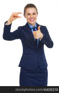 Happy business woman showing small risks gesture and thumbs up