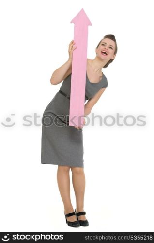 Happy business woman with big arrow pointing up. HQ photo. Not oversharpened. Not oversaturated. Happy business woman with big arrow pointing up isolated