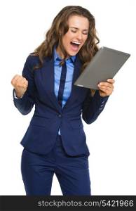 Happy business woman with tablet pc rejoicing success