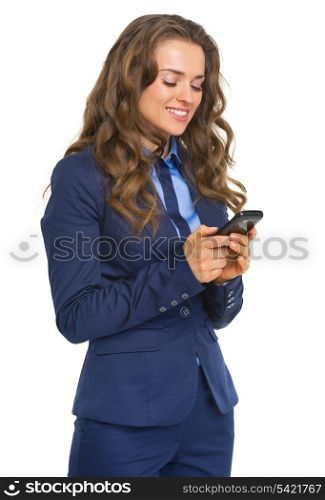 Happy business woman writing sms