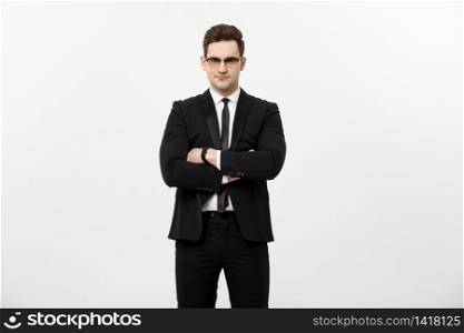 Happy businessman isolated - Successful handsome man standing with crossed arms isolated over white background. Happy businessman isolated - Successful handsome man standing with crossed arms isolated over white background.