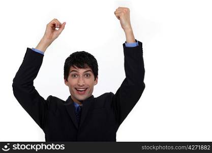 happy businessman raising hands