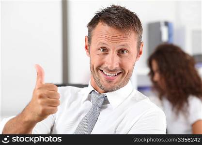 happy businessman with thumb up