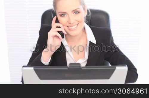 Happy Businesswoman On Cell Phone