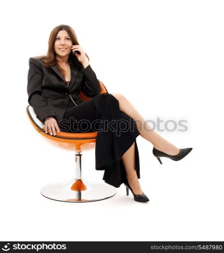 happy businesswoman with cell phone over white