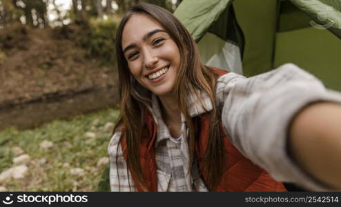 happy camping girl forest taking self