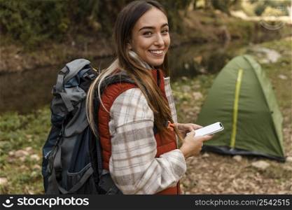 happy camping girl forest tent high view