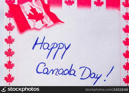 Happy Canada day handwriting on paper with Canada flag. Writing text on memo post reminder. Bucharest, Romania, 2020.