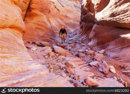 Happy Canyon fantastic scene. Unusual colorful sandstone formations in deserts of Utah are popular destination for hikers.