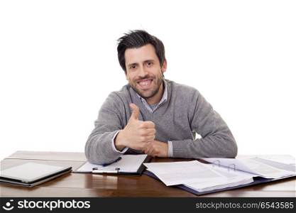 happy casual man on a desk, going thumb up, isolated on white background. happy casual man on a desk