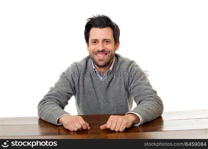 happy casual man on a desk, isolated on white background