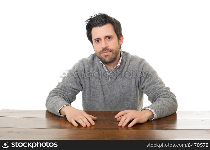 happy casual man on a desk, isolated on white background. happy man