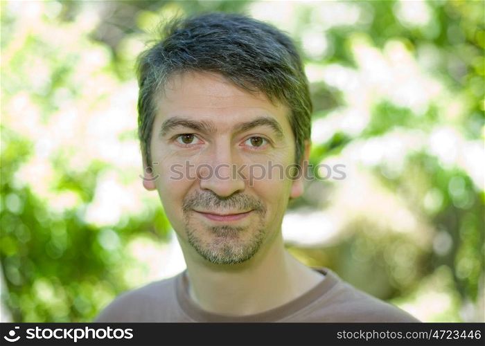 happy casual man portrait, outdoors, bokeh picture