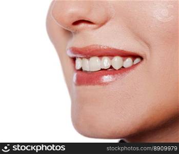 Happy cheerful girl’s smile with white teeth isolated on white. beautiful female smile
