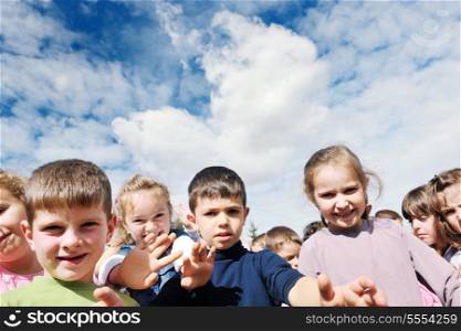happy child kids group have fun and play at kindergarden preschool education concept with teacher