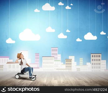 Happy childhood. Cute girl against drawn background riding three wheeled bike