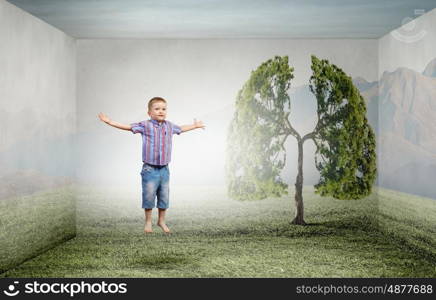 Happy childhood. Little cute boy in jump and colorful balloons around