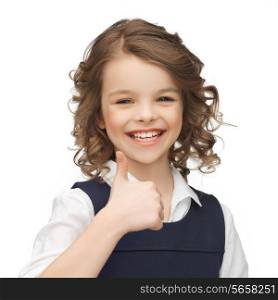 happy children and gestures concept - picture of beautiful pre-teen girl showing thumbs up
