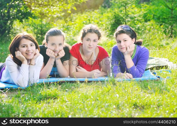 happy children group have fun outdoor in nature at suny day