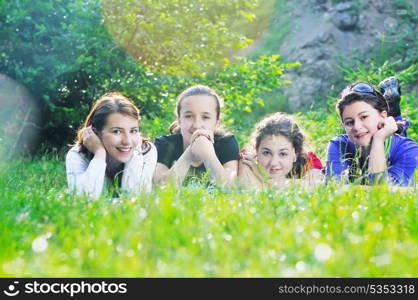 happy children group have fun outdoor in nature at suny day