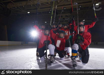 happy children group ice hockey team sport players portrait