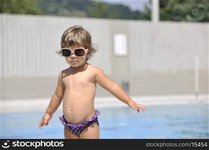 happy children have fun on swimming pool