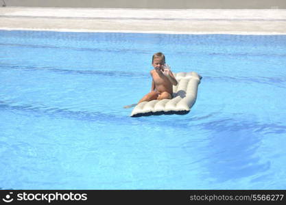 happy children have fun on swimming pool