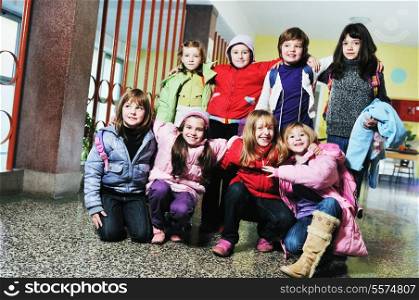 happy childrens group in schoold have fun and learning leassos