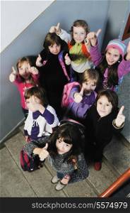 happy childrens group in schoold have fun and learning leassos