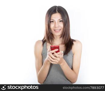 Happy Chinese woman texting with smartphone