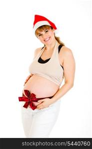 Happy christmas pregnant woman in Santa hat with red ribbon on belly isolated on white &#xA;
