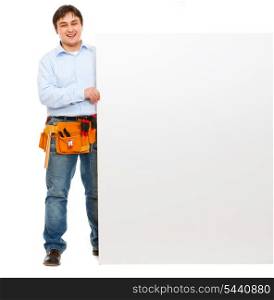 Happy construction worker holding blank billboard&#xA;