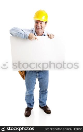 Happy construction worker pointing to a blank white sign. Full body isolated on white.