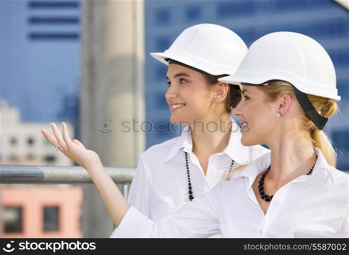 happy contractors in a front of building site