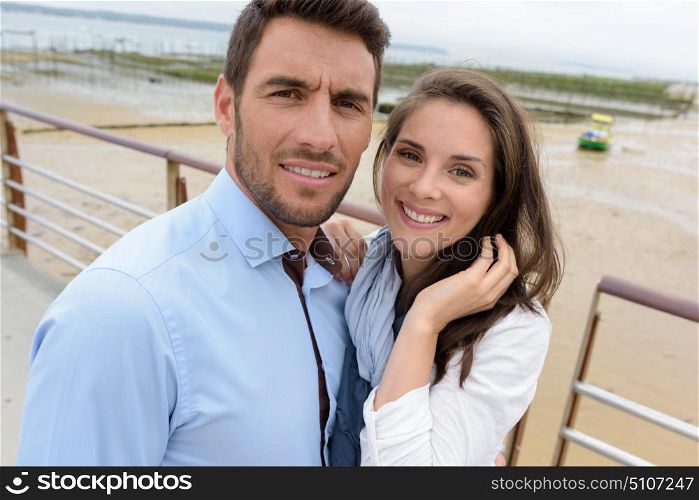 happy couple at a lake