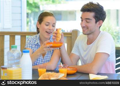 happy couple - breakfast in mobile home