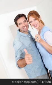 Happy couple buying new house