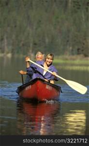 Happy Couple Canoeing