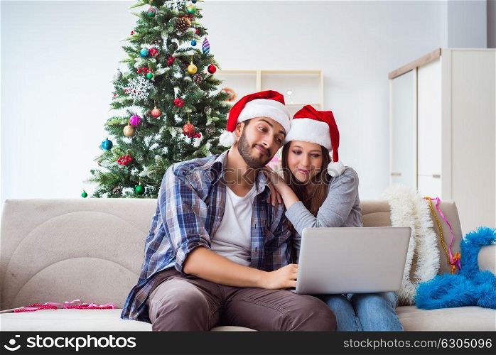 Happy couple celebrating christmas holiday