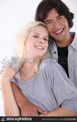 Happy couple embraced