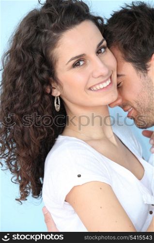 happy couple embracing and kissing