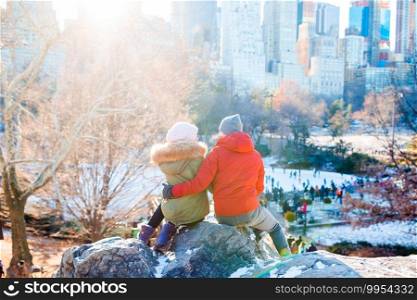 Happy couple enjoy the view of famous ice-rink. Happy couple enjoy the view of famous ice-rink in Central Park in New York City