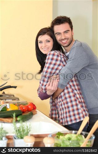 happy couple in a kitchen