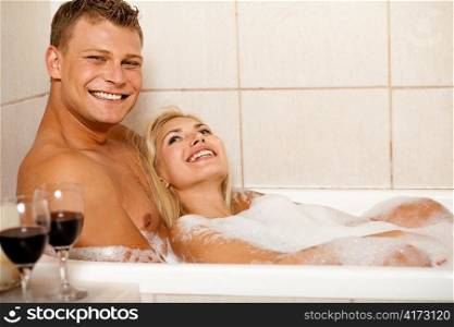 Happy couple in bath