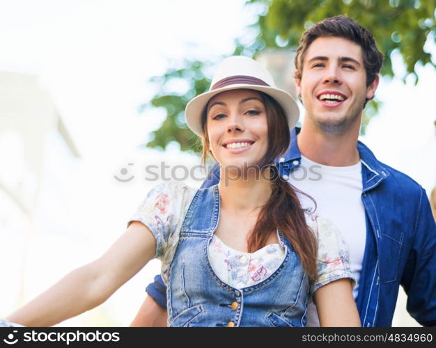 Happy couple in city with bike. Happy young couple in city with bike