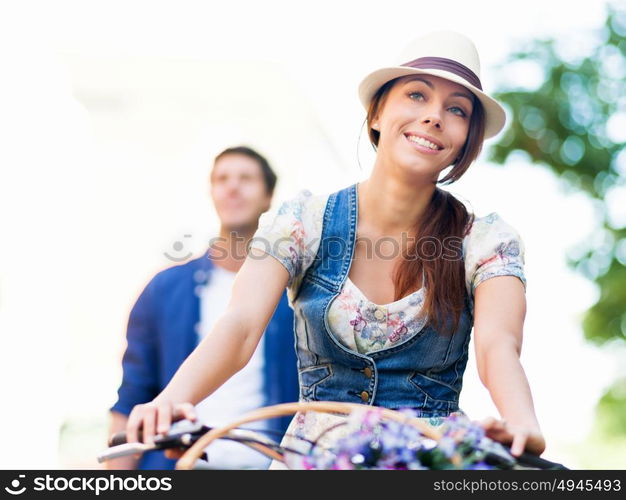 Happy couple in city with bike. Happy young couple in city with bike