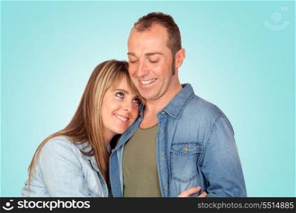 Happy couple in love isolated on blue background