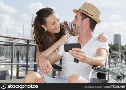 happy couple in love taking selfie in the port