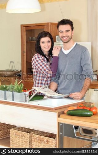 Happy couple in the kitchen