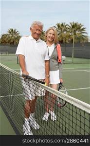 Happy Couple on the Tennis Court